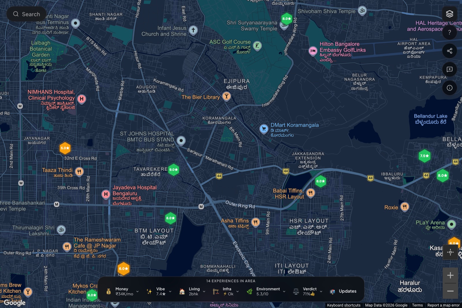 Map at zoom 14 over an Indian city, with hexagonal building markers carrying star ratings (8.0★, 9.0★, 7.4★ etc.) and the &ldquo;14 EXPERIENCES IN AREA&rdquo; dock pinned at the bottom